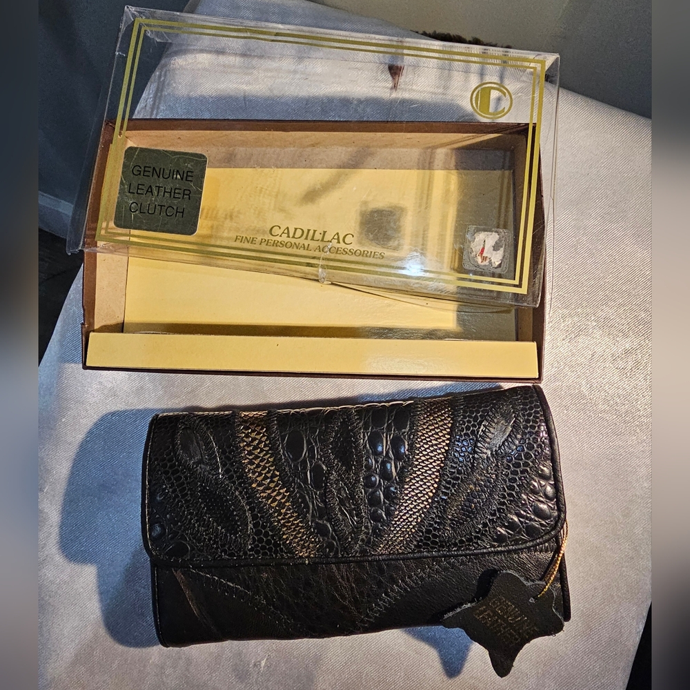 Cadillac brand leather wallet, new in its box.